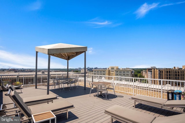 deck featuring outdoor dining area