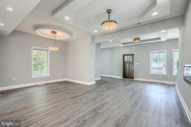 4106 Fleetwood Ave, Baltimore, MD 21206 - unfurnished living room with a tray ceiling, wood finished floors, healthy amount of natural light, baseboards, and recessed lighting