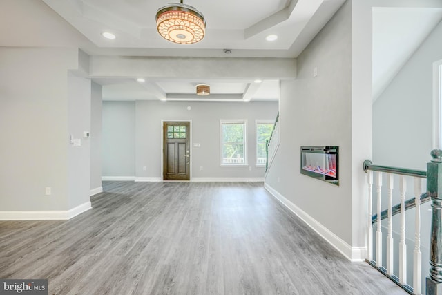 4106 Fleetwood Ave, Baltimore, MD 21206 - unfurnished living room featuring wood finished floors, baseboards, recessed lighting, and a glass covered fireplace