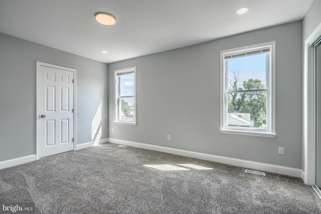 4106 Fleetwood Ave, Baltimore, MD 21206 - unfurnished bedroom with carpet flooring and baseboards