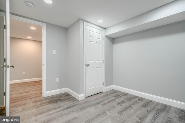 4106 Fleetwood Ave, Baltimore, MD 21206 - below grade area featuring wood finished floors, recessed lighting, and baseboards