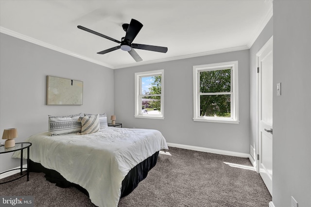 bedroom with ornamental molding, carpet floors, baseboards, and ceiling fan