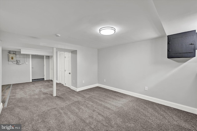 finished below grade area featuring carpet and baseboards