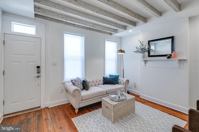 1926 Webster St, Philadelphia, PA 19146 - living area featuring beamed ceiling, baseboards, and wood finished floors