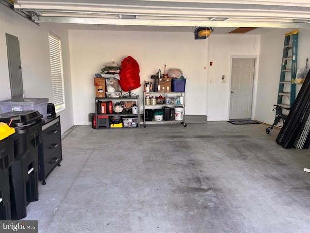 garage featuring a garage door opener