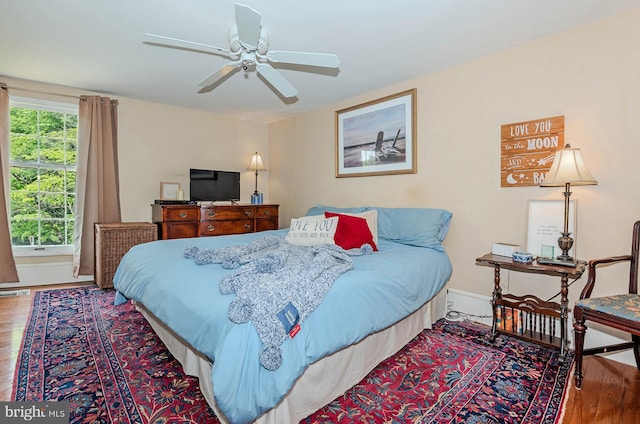 818 Aylesbury Garth, Arnold, MD 21012 - bedroom with wood finished floors, baseboards, and ceiling fan