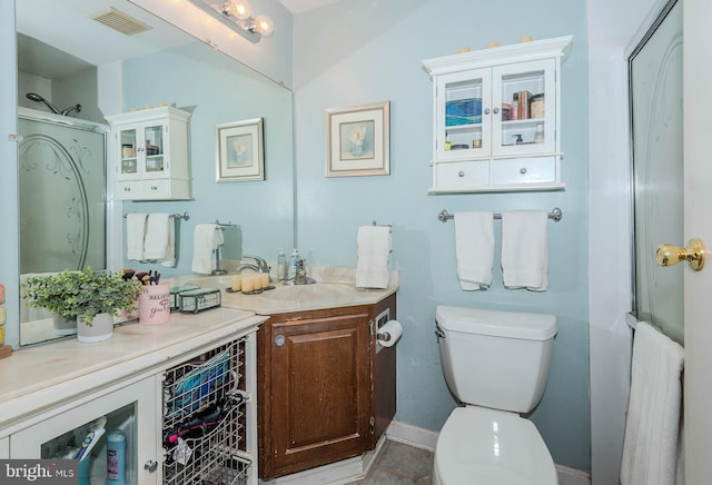 818 Aylesbury Garth, Arnold, MD 21012 - bathroom featuring vanity, toilet, a shower with shower door, and baseboards
