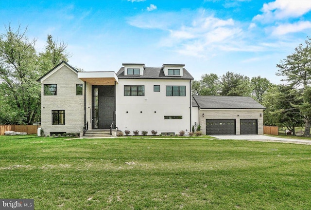 contemporary home with a garage and driveway