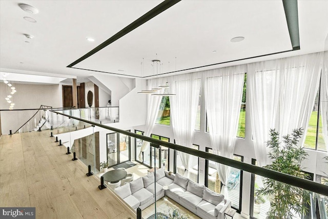 interior space with wood finished floors and recessed lighting
