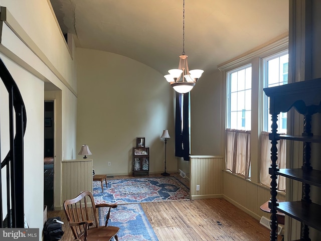 120 Hanover St, Pemberton, NJ 08068 - dining area with wood-type flooring, lofted ceiling, a chandelier, and baseboards
