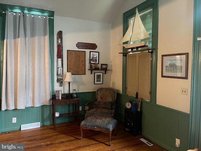 120 Hanover St, Pemberton, NJ 08068 - living area featuring wood finished floors, wainscoting, and vaulted ceiling
