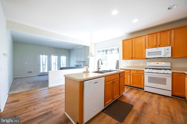 7 Merryton St, Voorhees, NJ 08043 - kitchen featuring white appliances, a sink, light wood finished floors, open floor plan, and light countertops