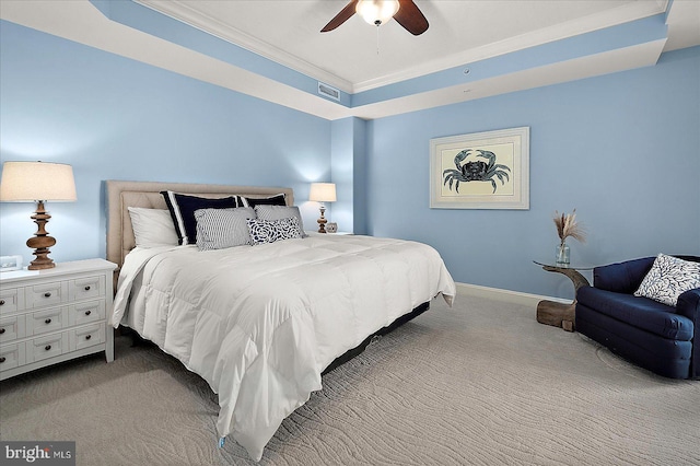 121 81st St Unit 705, Ocean City, MD 21842 - carpeted bedroom featuring a raised ceiling, baseboards, a ceiling fan, and crown molding