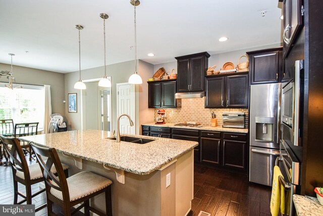 130 Steamboat Ct, North East, MD 21901 - kitchen featuring a sink, appliances with stainless steel finishes, under cabinet range hood, dark wood-type flooring, and backsplash