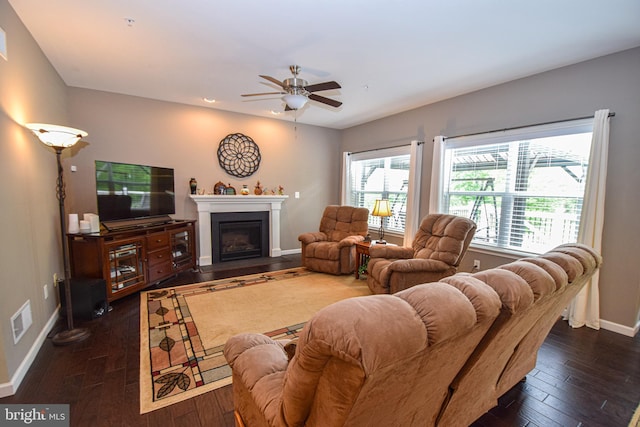 130 Steamboat Ct, North East, MD 21901 - living area featuring dark wood-style floors, baseboards, a glass covered fireplace, and ceiling fan