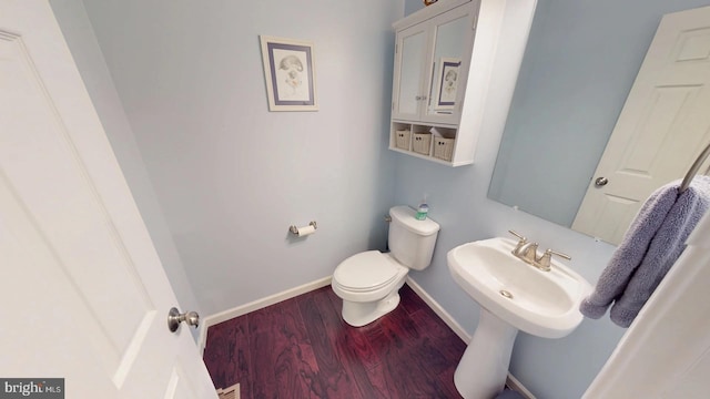 130 Steamboat Ct, North East, MD 21901 - bathroom with wood finished floors, toilet, and baseboards