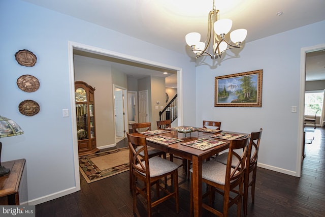 130 Steamboat Ct, North East, MD 21901 - dining space featuring baseboards, dark wood-style flooring, stairs, and a chandelier