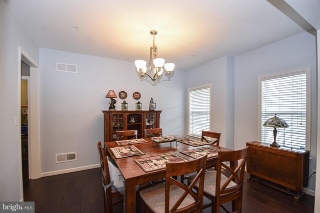 130 Steamboat Ct, North East, MD 21901 - dining room featuring a chandelier, hardwood / wood-style floors, and baseboards