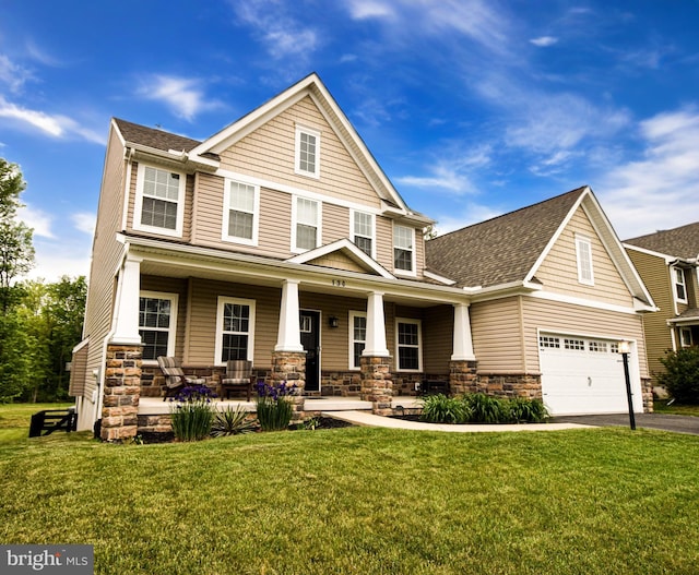 130 Steamboat Ct, North East, MD 21901 - craftsman house with stone siding, asphalt driveway, a porch, a shingled roof, and an attached garage