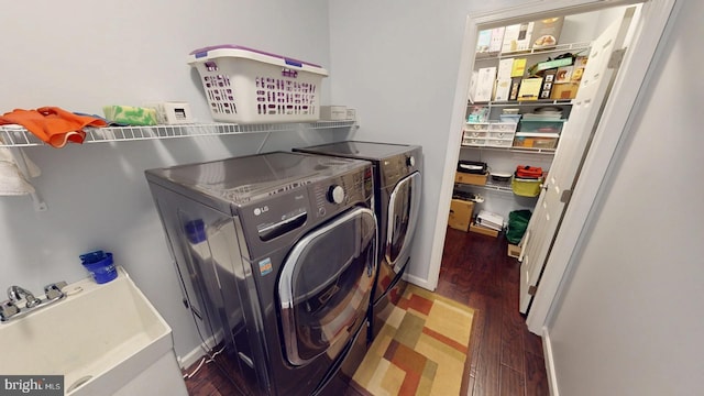 130 Steamboat Ct, North East, MD 21901 - laundry area with washer and clothes dryer and wood finished floors