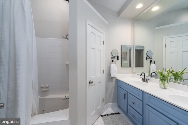 bathroom featuring tile patterned floors, double vanity, shower / bath combination with curtain, recessed lighting, and baseboards