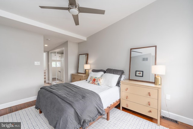 bedroom with wood finished floors, baseboards, a ceiling fan, and recessed lighting