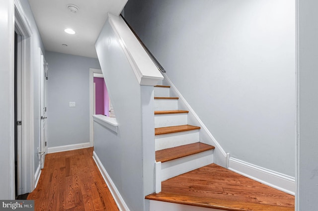 1248 N Hollywood St, Philadelphia, PA 19121 - staircase with wood finished floors, baseboards, and recessed lighting