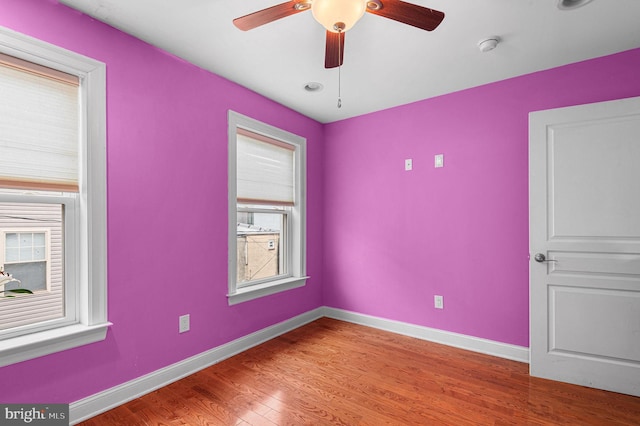 1248 N Hollywood St, Philadelphia, PA 19121 - empty room featuring baseboards, wood finished floors, and ceiling fan