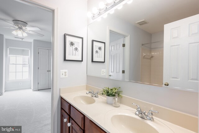 615 Pearl Point Ct, Millersville, MD 21108 - bathroom featuring double vanity, ceiling fan, and a shower