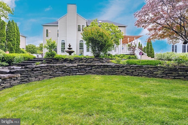 615 Pearl Point Ct, Millersville, MD 21108 - rear view of property featuring a chimney and a yard