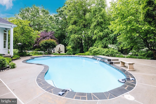 615 Pearl Point Ct, Millersville, MD 21108 - swimming pool featuring a patio and view of scattered trees