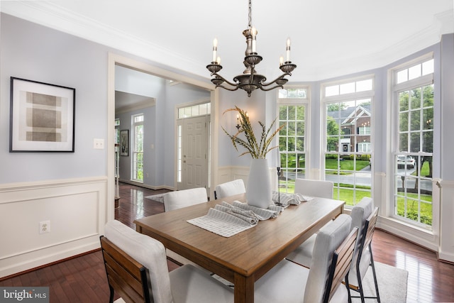 615 Pearl Point Ct, Millersville, MD 21108 - dining space featuring crown molding, a wainscoted wall, dark wood-type flooring, and a chandelier