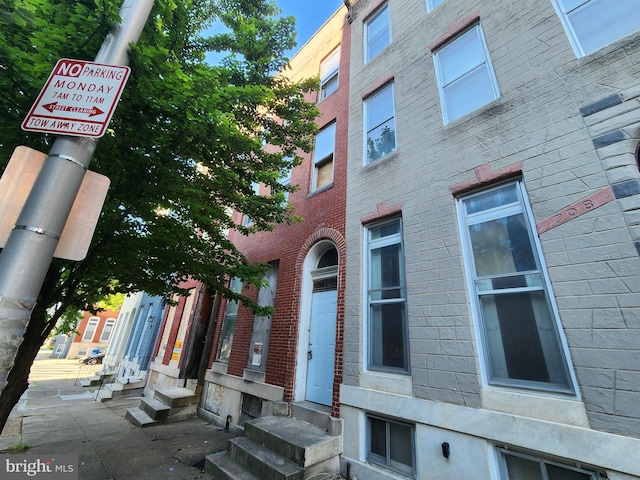 view of building exterior with entry steps