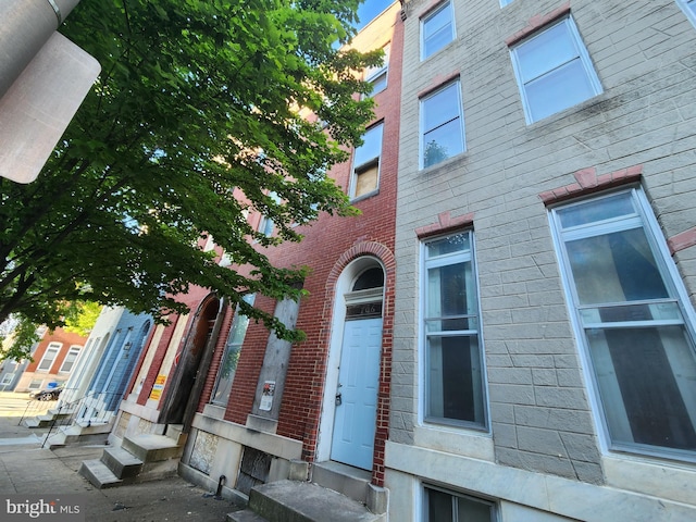 view of building exterior featuring entry steps