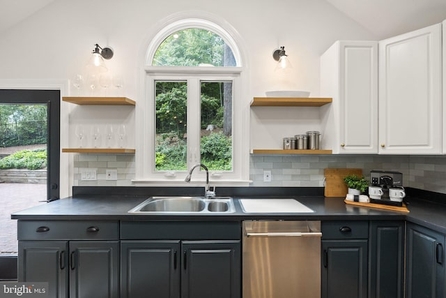4009 30th St N, Arlington, VA 22207 - kitchen with open shelves, vaulted ceiling, dark countertops, a sink, and white cabinetry