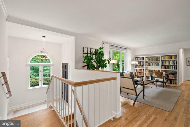 4009 30th St N, Arlington, VA 22207 - sitting room featuring an upstairs landing, wood finished floors, crown molding, and baseboards