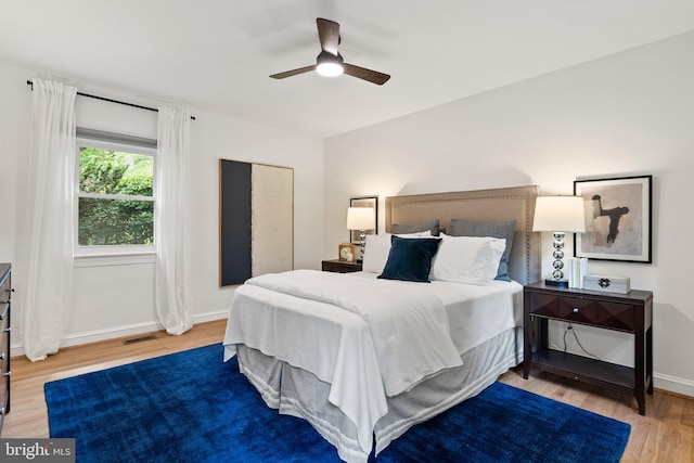 4009 30th St N, Arlington, VA 22207 - bedroom with wood finished floors, baseboards, and a ceiling fan