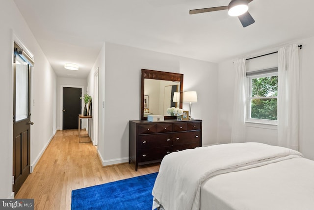 4009 30th St N, Arlington, VA 22207 - bedroom with light wood finished floors, baseboards, and ceiling fan