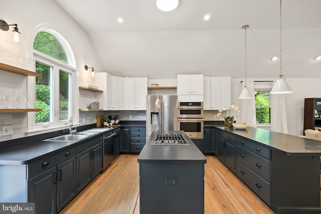 4009 30th St N, Arlington, VA 22207 - kitchen featuring open shelves, a sink, dark countertops, a center island, and high vaulted ceiling