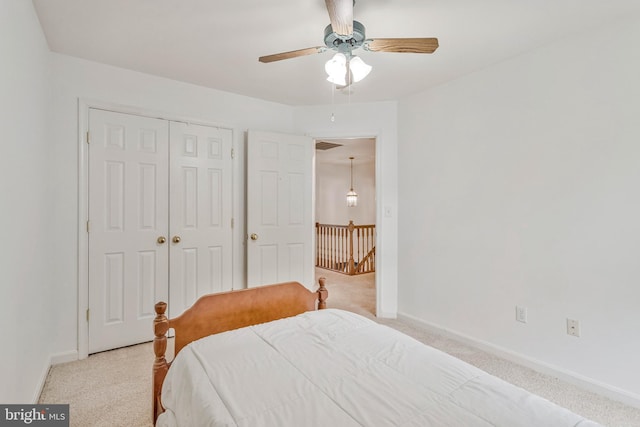 2452 Tuckahoe Ct, Waldorf, MD 20601 - carpeted bedroom featuring baseboards, a closet, and ceiling fan
