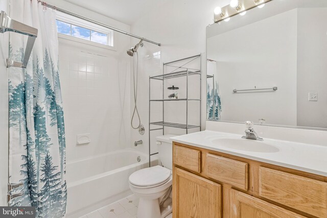 2452 Tuckahoe Ct, Waldorf, MD 20601 - bathroom featuring shower / bath combination with curtain, toilet, vanity, and tile patterned flooring