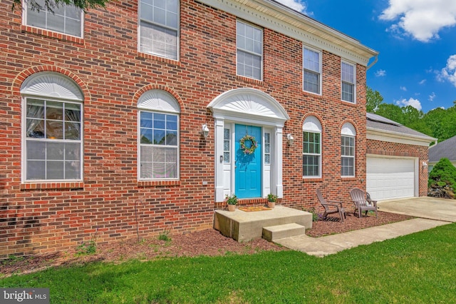2452 Tuckahoe Ct, Waldorf, MD 20601 - view of front of property with brick siding, concrete driveway, and an attached garage