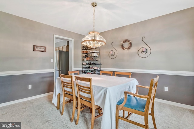 2452 Tuckahoe Ct, Waldorf, MD 20601 - carpeted dining space featuring a chandelier and baseboards