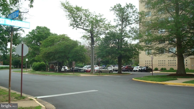 6641 Wakefield Dr Unit 801, Alexandria, VA 22307 - view of asphalt street featuring traffic signs, curbs, and sidewalks