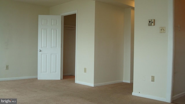 6641 Wakefield Dr Unit 801, Alexandria, VA 22307 - unfurnished bedroom featuring carpet floors, a closet, and baseboards