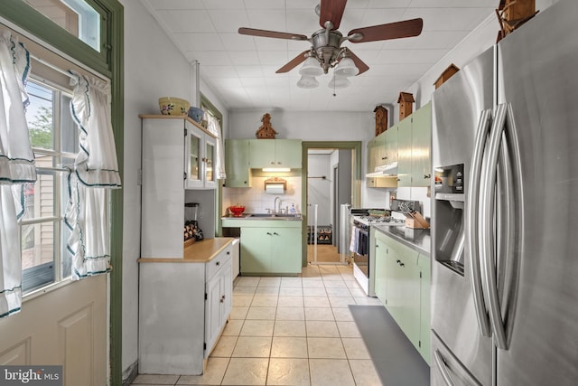 848 Houston St, Columbia, PA 17512 - kitchen featuring stainless steel fridge with ice dispenser, range with gas stovetop, green cabinetry, under cabinet range hood, and a ceiling fan