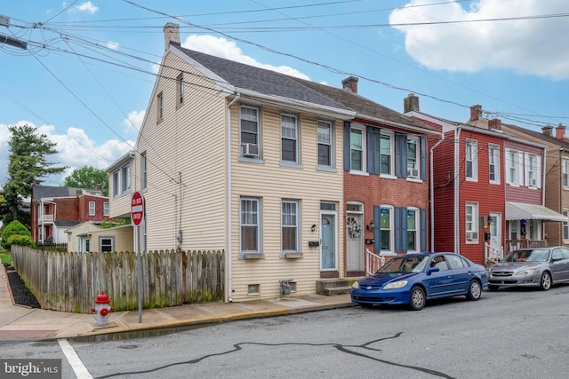 848 Houston St, Columbia, PA 17512 - view of property with a chimney, fence, and cooling unit