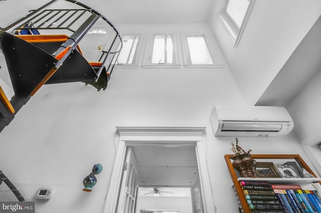 detailed view of a wall mounted air conditioner and ceiling fan