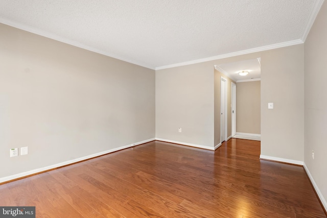 1300 Crystal Dr Unit 1408S, Arlington, VA 22202 - unfurnished room with ornamental molding, wood finished floors, baseboards, and a textured ceiling