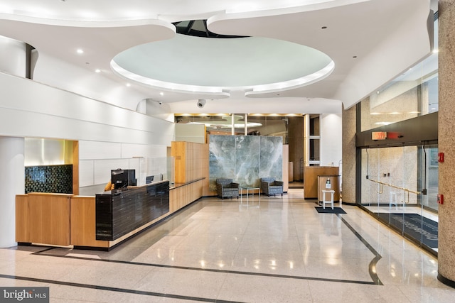 1300 Crystal Dr Unit 1408S, Arlington, VA 22202 - welcome area with a towering ceiling and recessed lighting